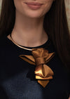 A unique vertical women's bow tie in mustard yellow handmade luxury neck accessory, women statement tie, vertical bow tie for women, gold satin necktie, elegant women tie, unique bow tie alternative, luxury handmade tie, artistic neckwear for women, modern formal accessory, gold statement necklace tie, designer women necktie, wedding guest accessory women, avant garde fashion tie, silk bow tie alternative, bold women fashion accessory, golden necktie women, formal outfit statement piece stylish office acces